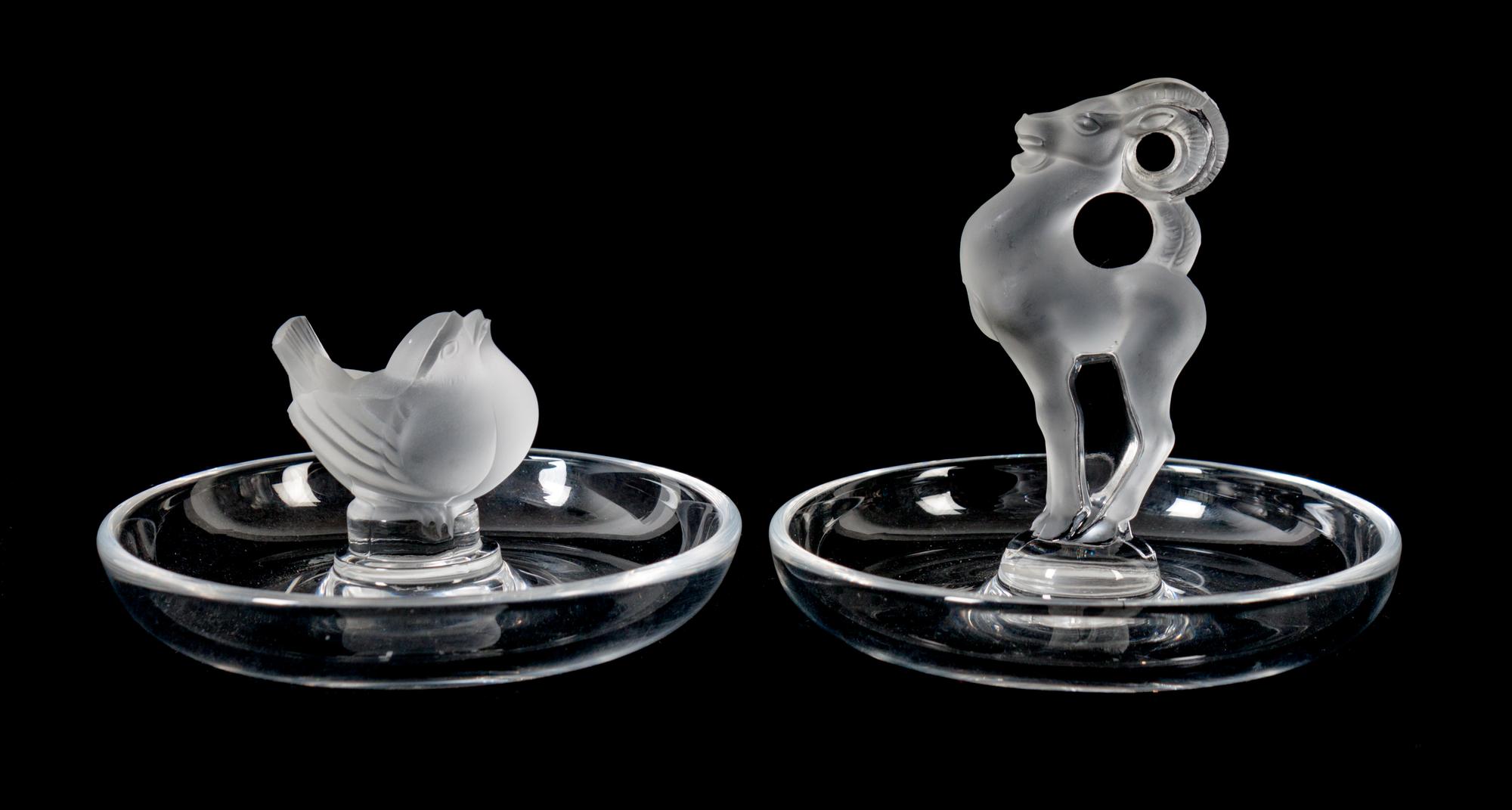 Eight Lalique Molded and Frosted Crystal Ring Dishes Height of taller 3 3/4 inches. — 20TH CENTURY