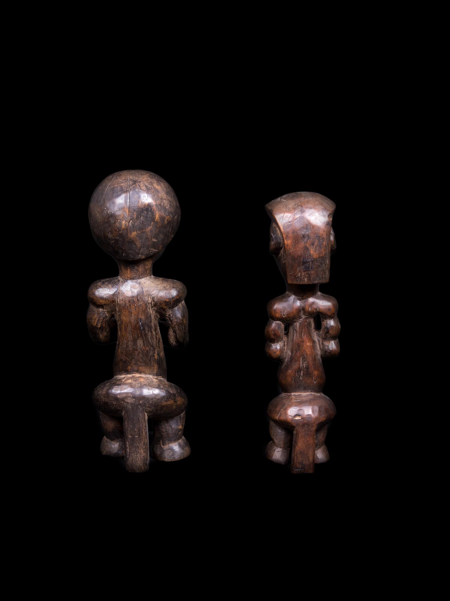 Two Fang Wood Figures