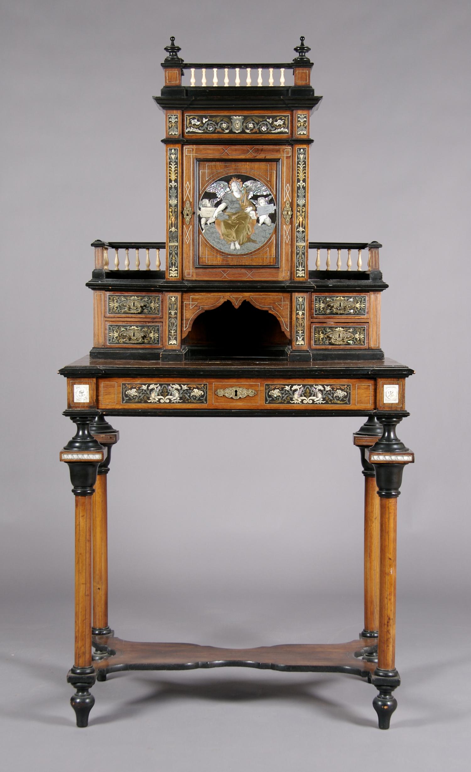 A Continental Ebony, Ivory and Metal Inlaid Desk, Height 66 x width 33 3/4 x depth 19 1/4 inches.