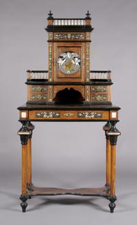 A Continental Ebony, Ivory and Metal Inlaid Desk, Height 66 x width 33 3/4 x depth 19 1/4 inches.