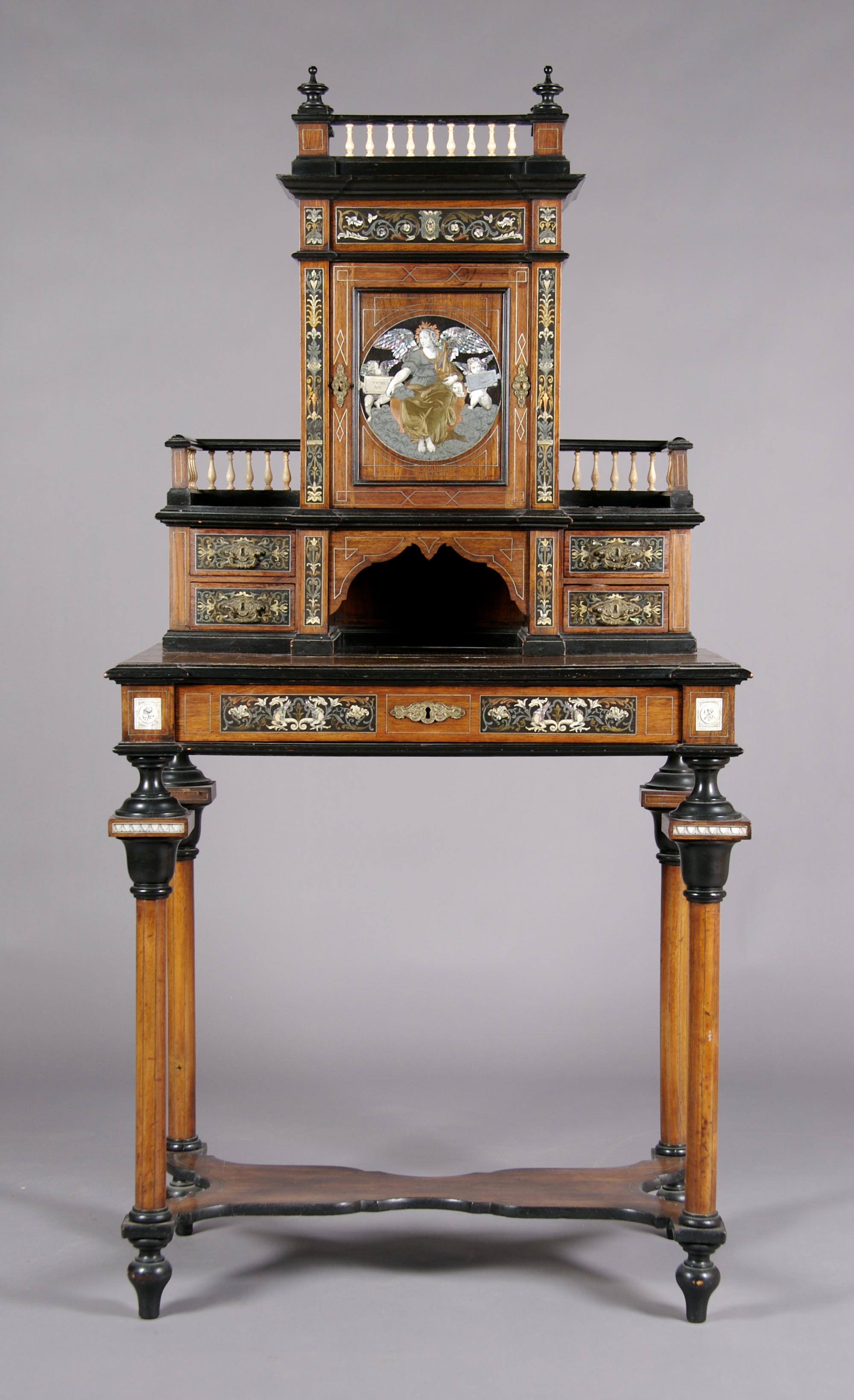 A Continental Ebony, Ivory and Metal Inlaid Desk, Height 66 x width 33 3/4 x depth 19 1/4 inches.