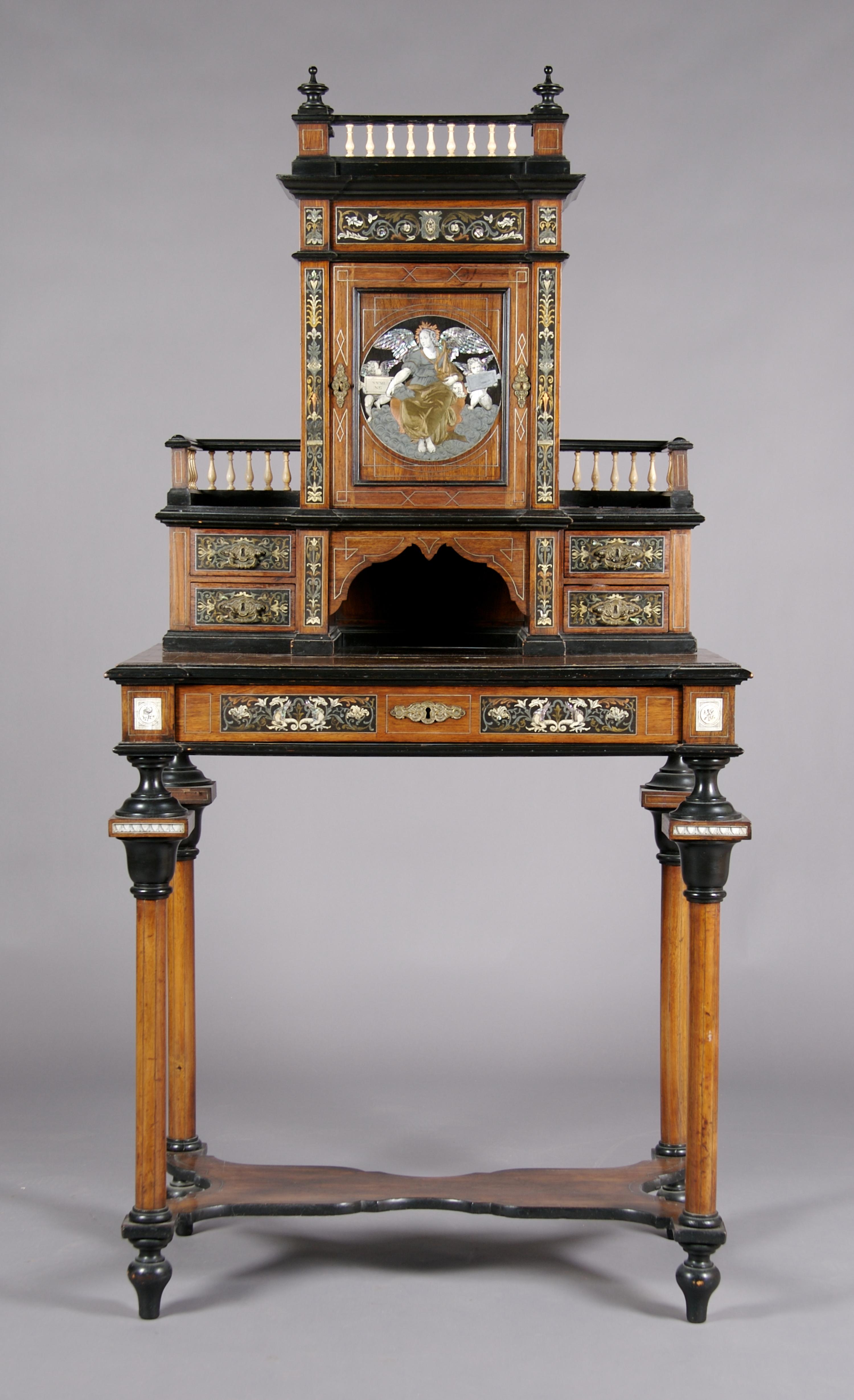 A Continental Ebony, Ivory and Metal Inlaid Desk, Height 66 x width 33 3/4 x depth 19 1/4 inches.