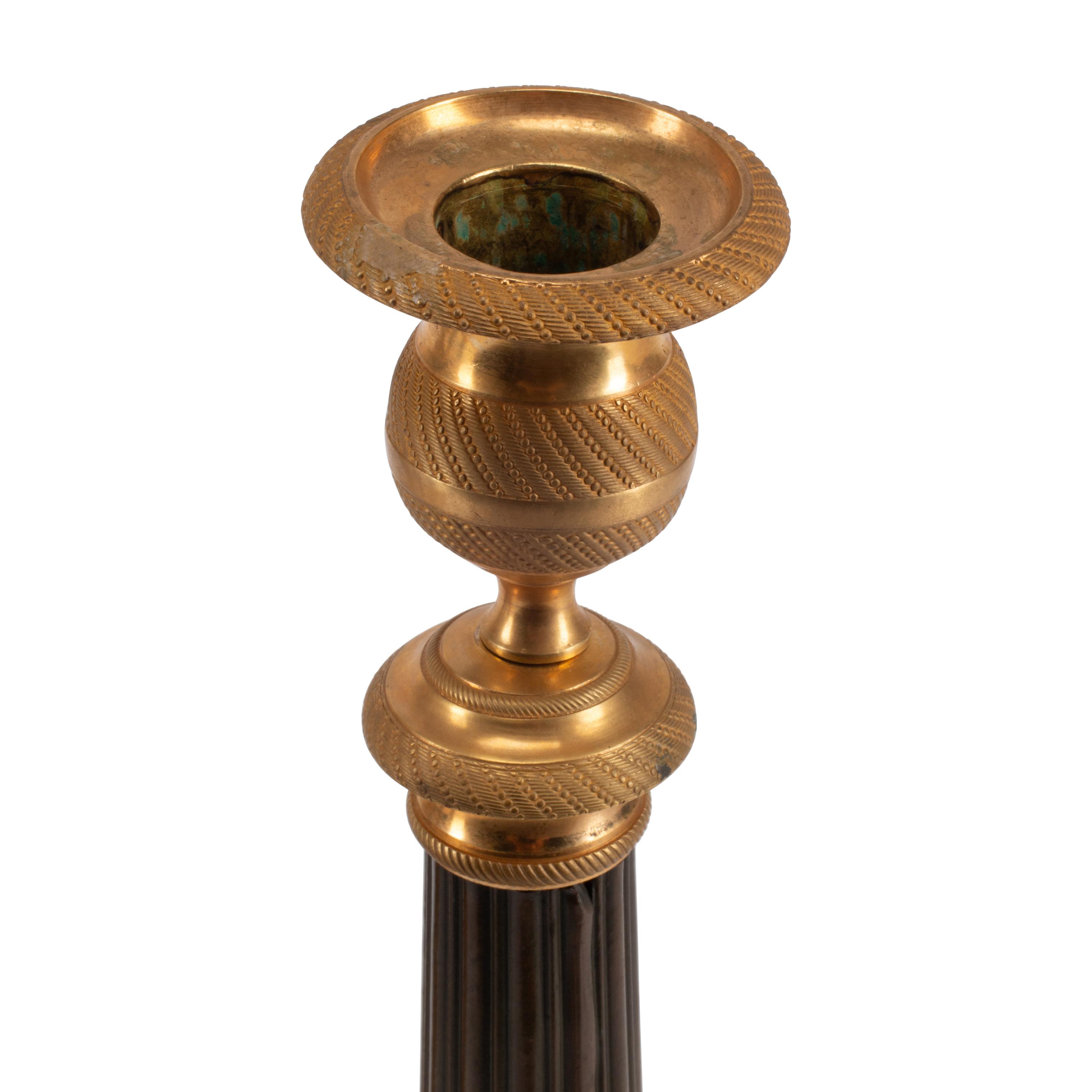 Two Pairs of Empire Style Brass Candlesticks