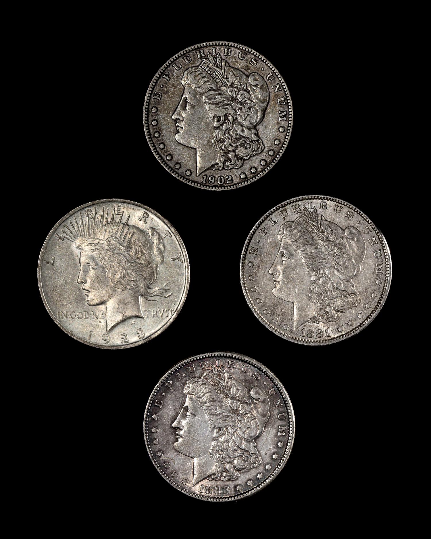 A Group of Three United States Morgan Silver $1 Coins