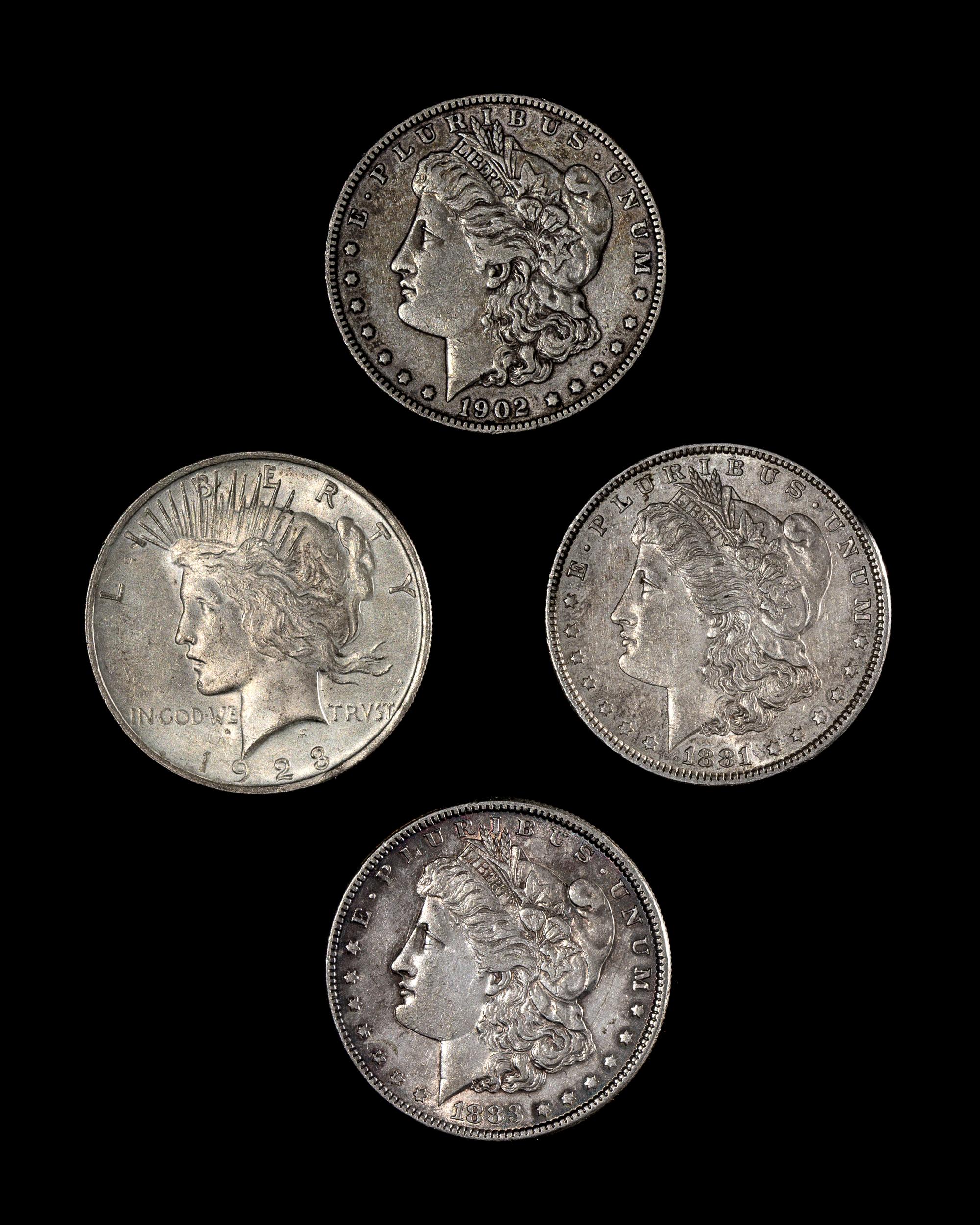 A Group of Three United States Morgan Silver $1 Coins