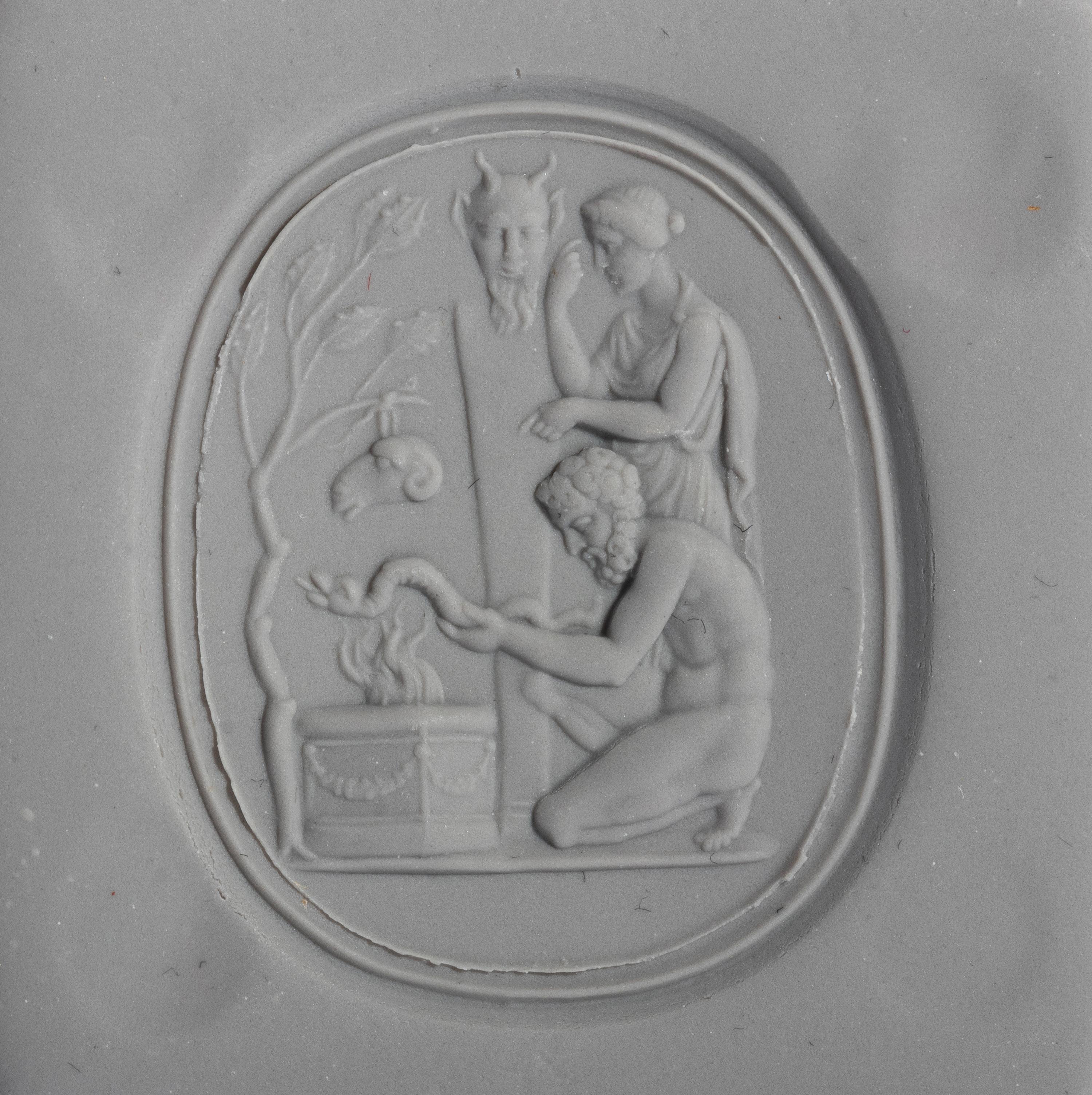 A Neoclassical Carnelian and Gold Finger Ring with a Mythological Scene