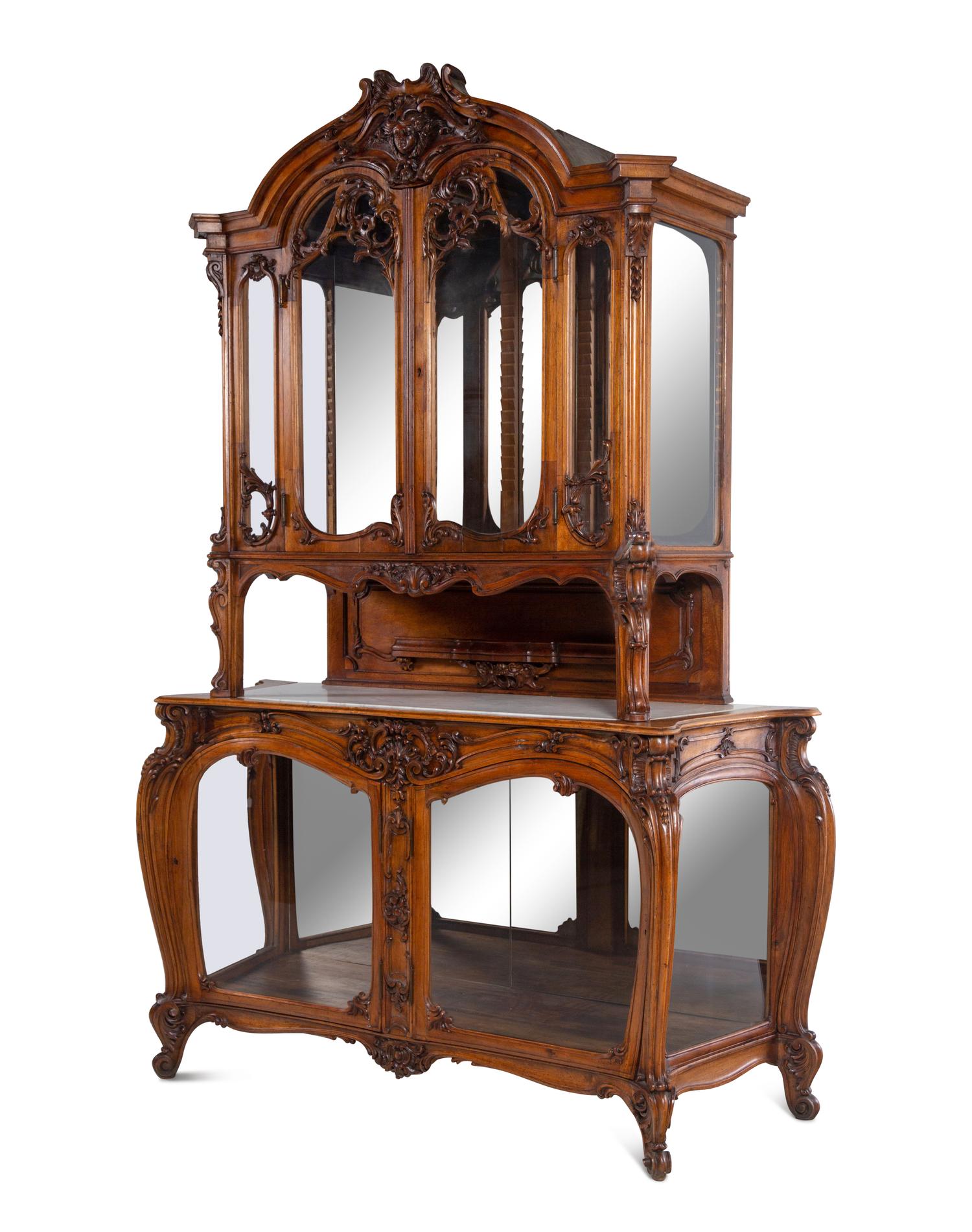 A Louis XV Style Carved Walnut Buffet à Deux Corps