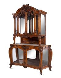 A Louis XV Style Carved Walnut Buffet à Deux Corps