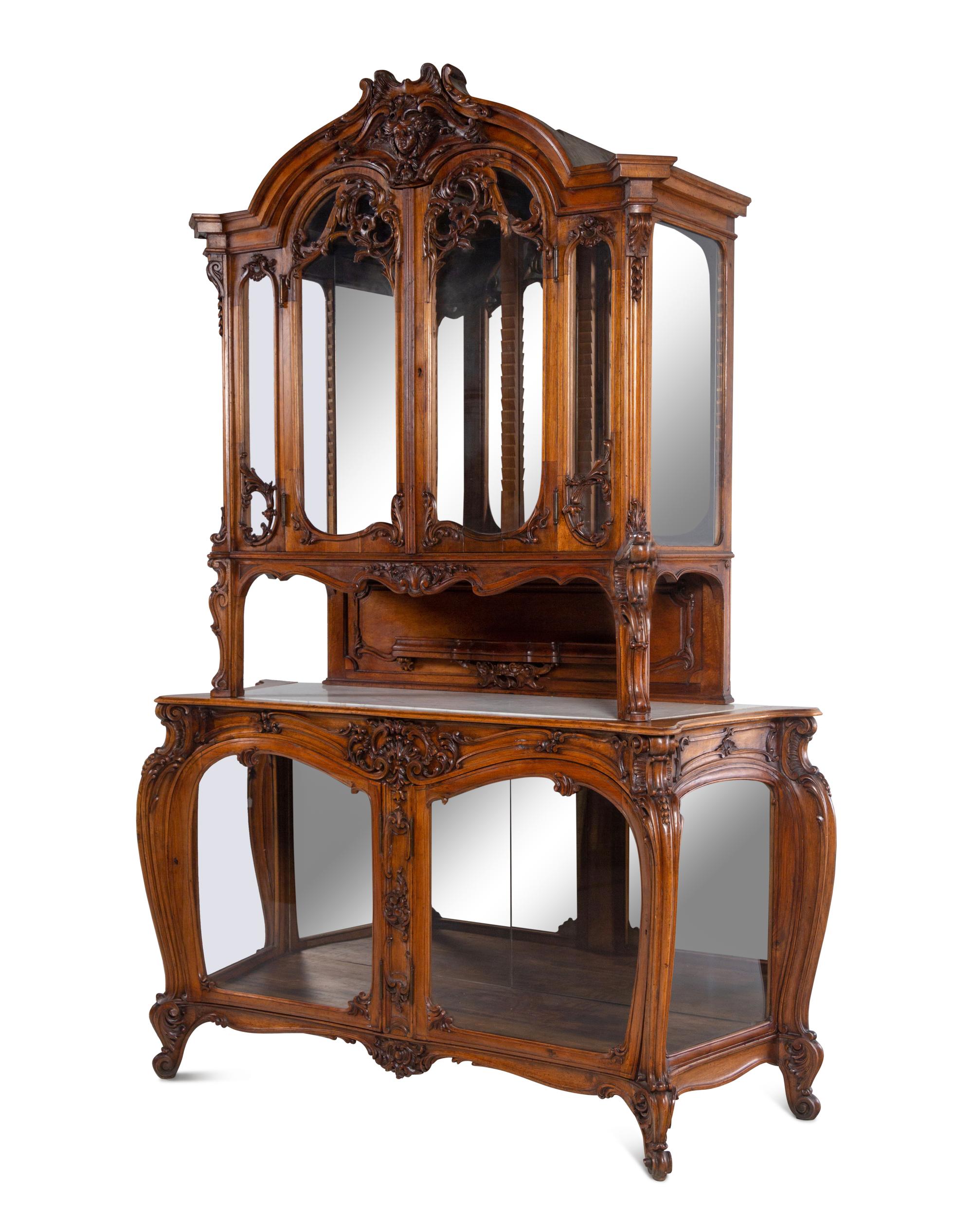 A Louis XV Style Carved Walnut Buffet à Deux Corps
