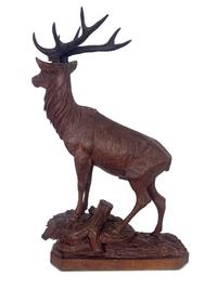 A Swiss Black Forest Carved Stag