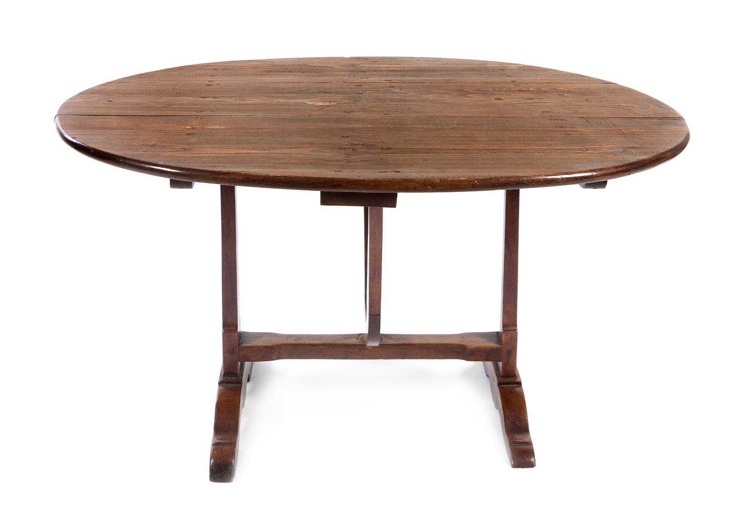 An American Oak Tilt-Top Breakfast Table Height 26 1/2 x width 50 1/4 x depth 40 1/4 inches. — 20TH CENTURY