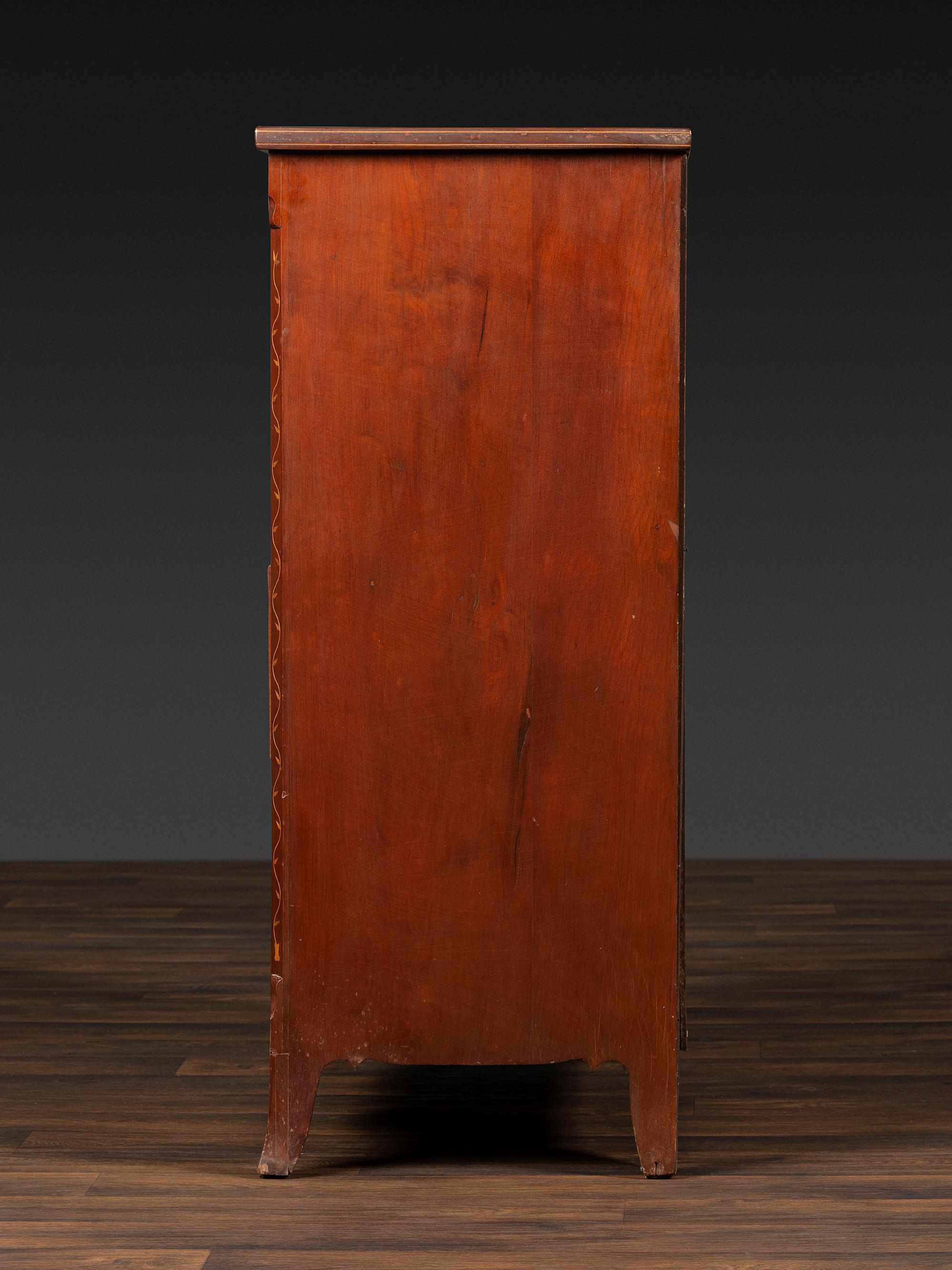 A Federal Vine and Leaf Inlaid Cherrywood Chest of Drawers