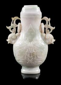 A Jadeite Covered Vase Height 6 1/4 inches. — 20TH CENTURY