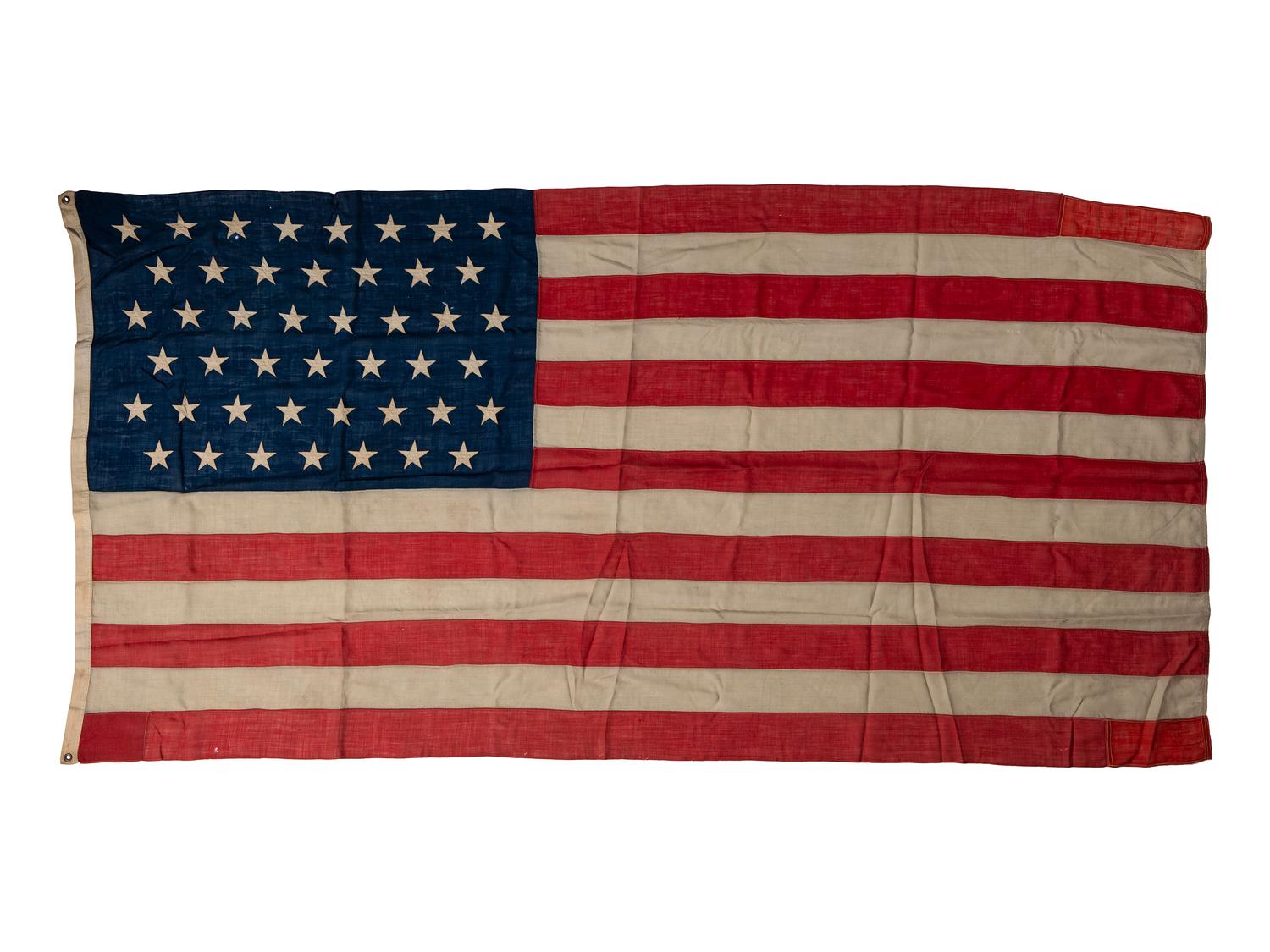 [CIVIL WAR]. A group of 2 American flags, incl. 44-star flag identified to “Camp 6 SoV ILL DIV USA” (Sons of Veterans, Illinois Division USA). [Ca 1891-1896].