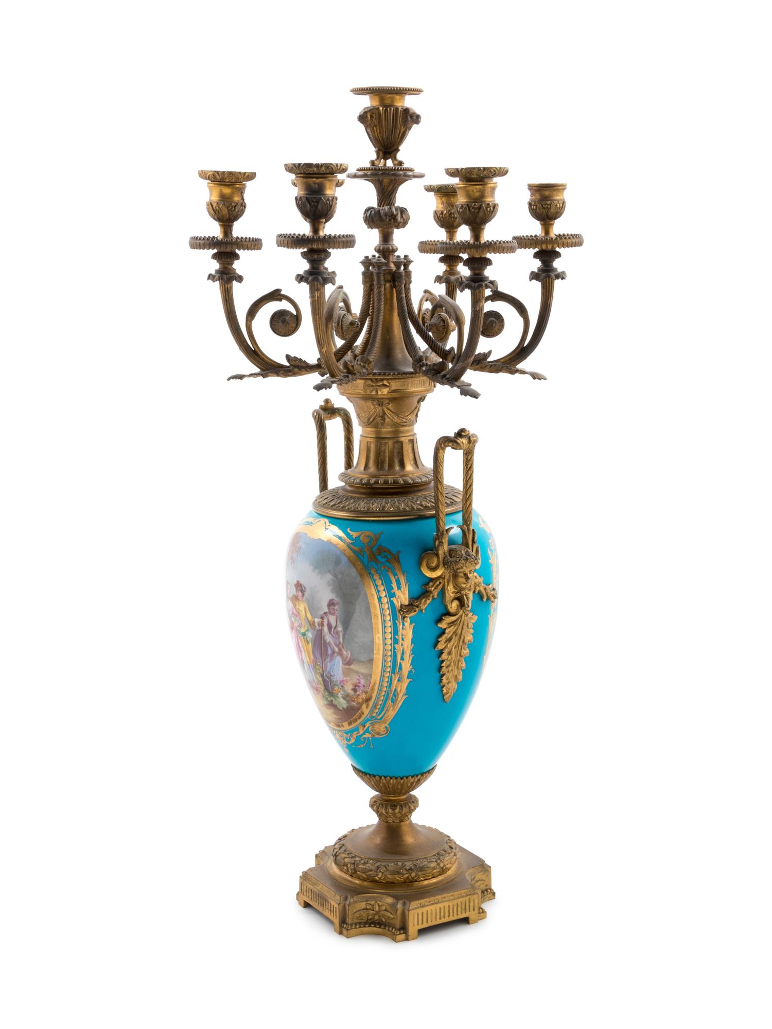 A Sèvres Style Gilt Bronze Mounted Painted and Parcel Gilt Celeste-Blue Ground Porcelain Seven-Light Candelabrum