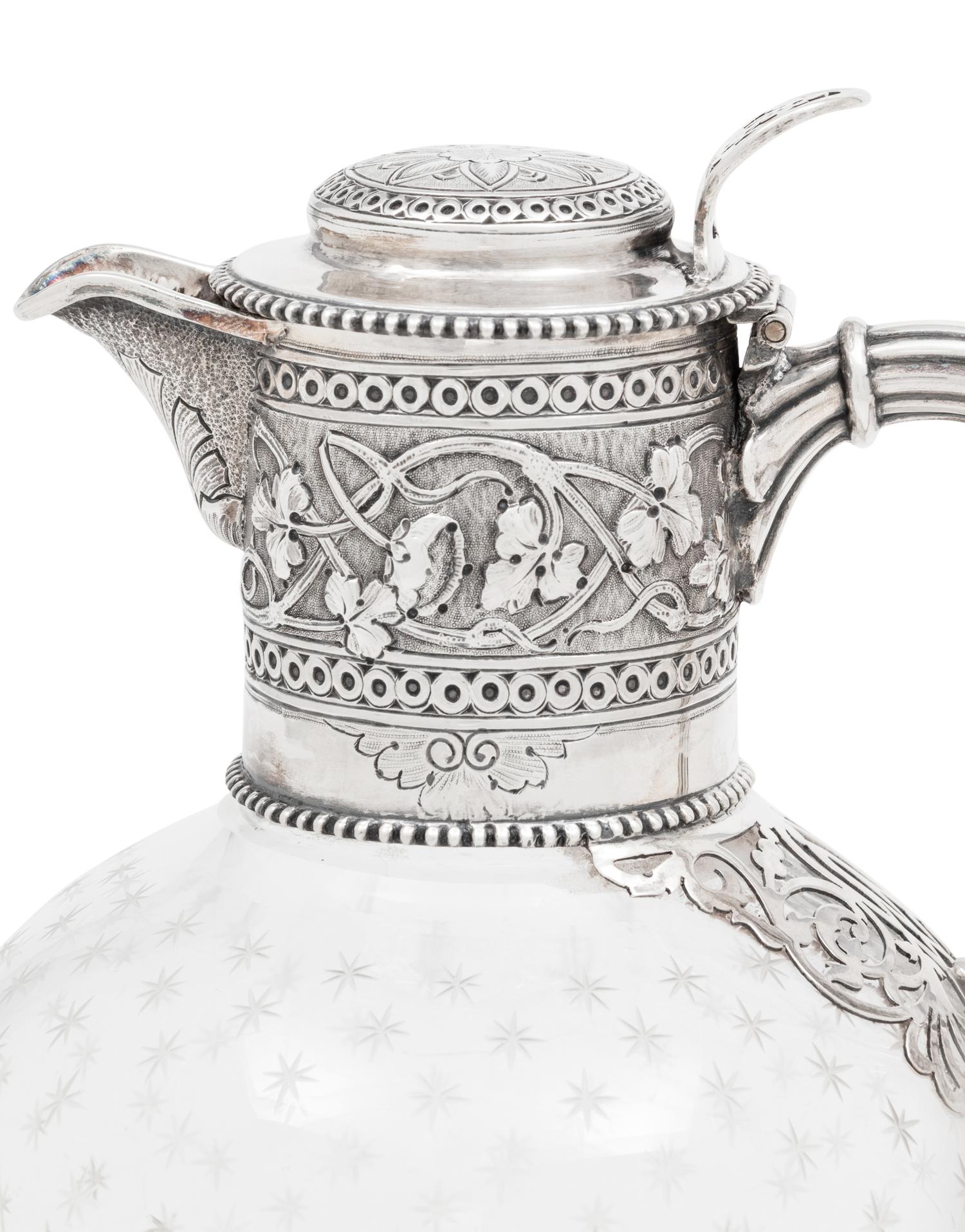 Two Silver-Mounted Glass Pitchers