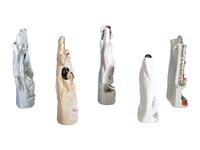 Four Staffordshire Glazed Figures and a Figural Spill Vase
