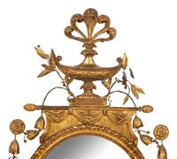 A Neoclassical Style Giltwood Oval Mirror