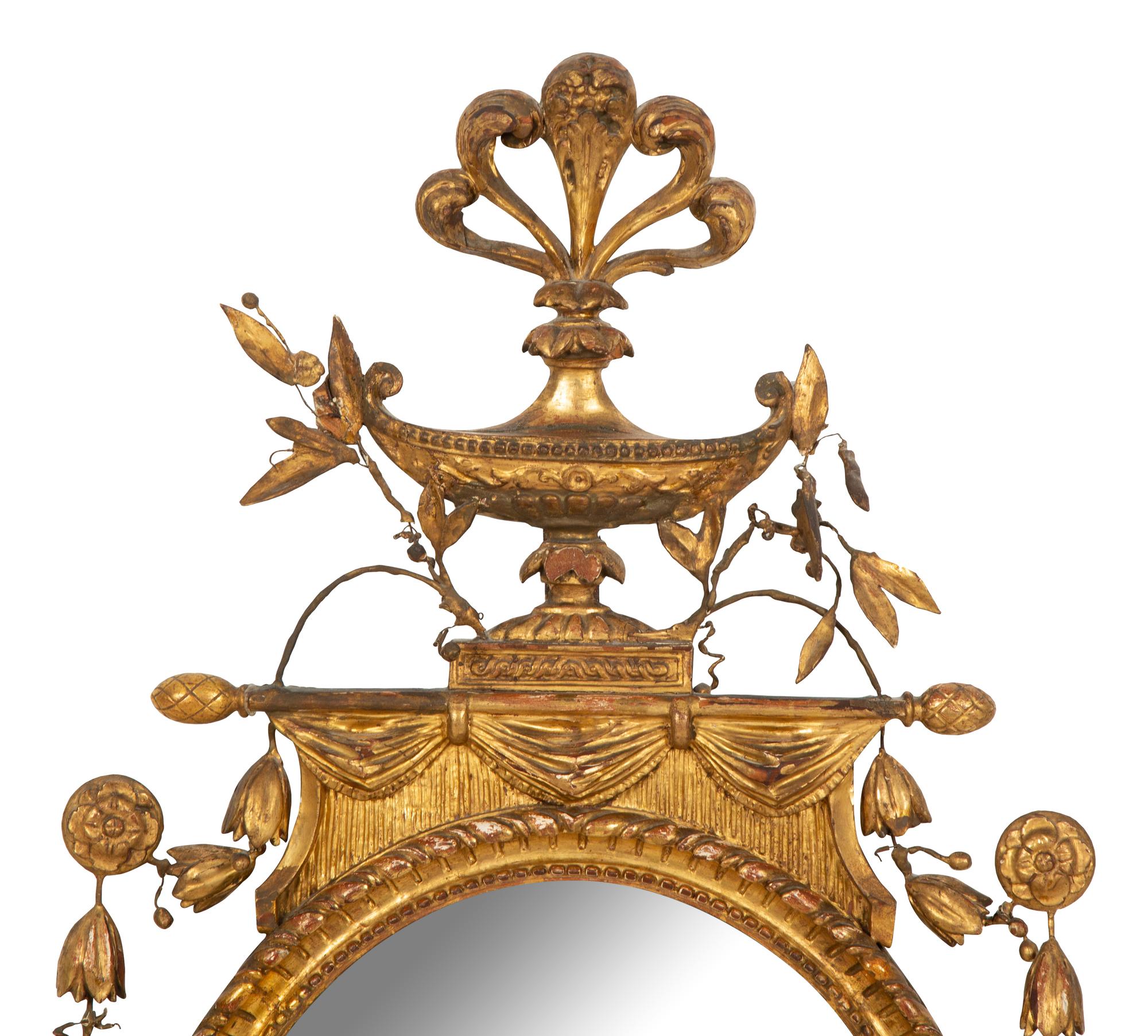 A Neoclassical Style Giltwood Oval Mirror