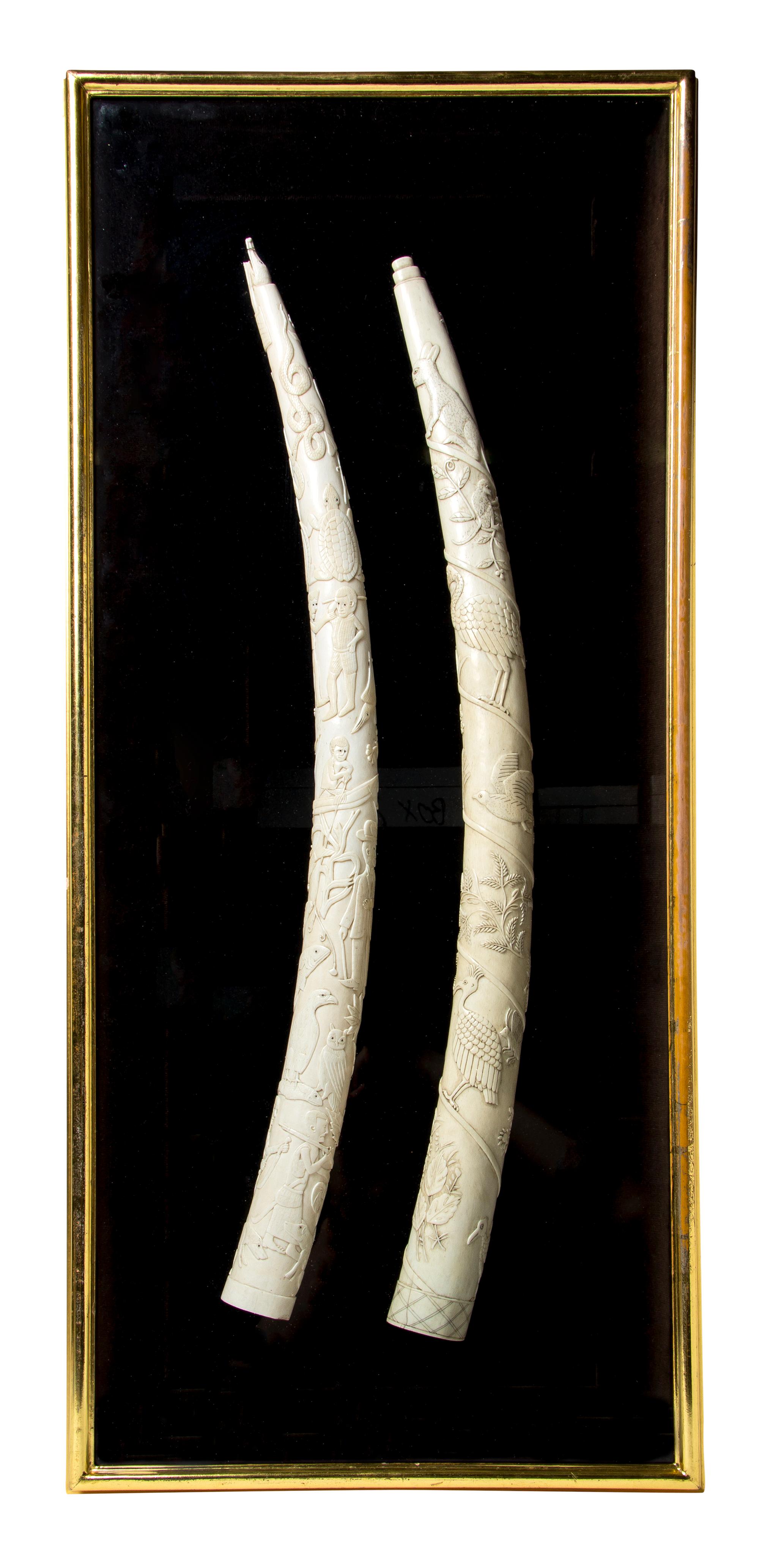 Two Relief Carved Ivory Tusks, Length of first 26 inches.