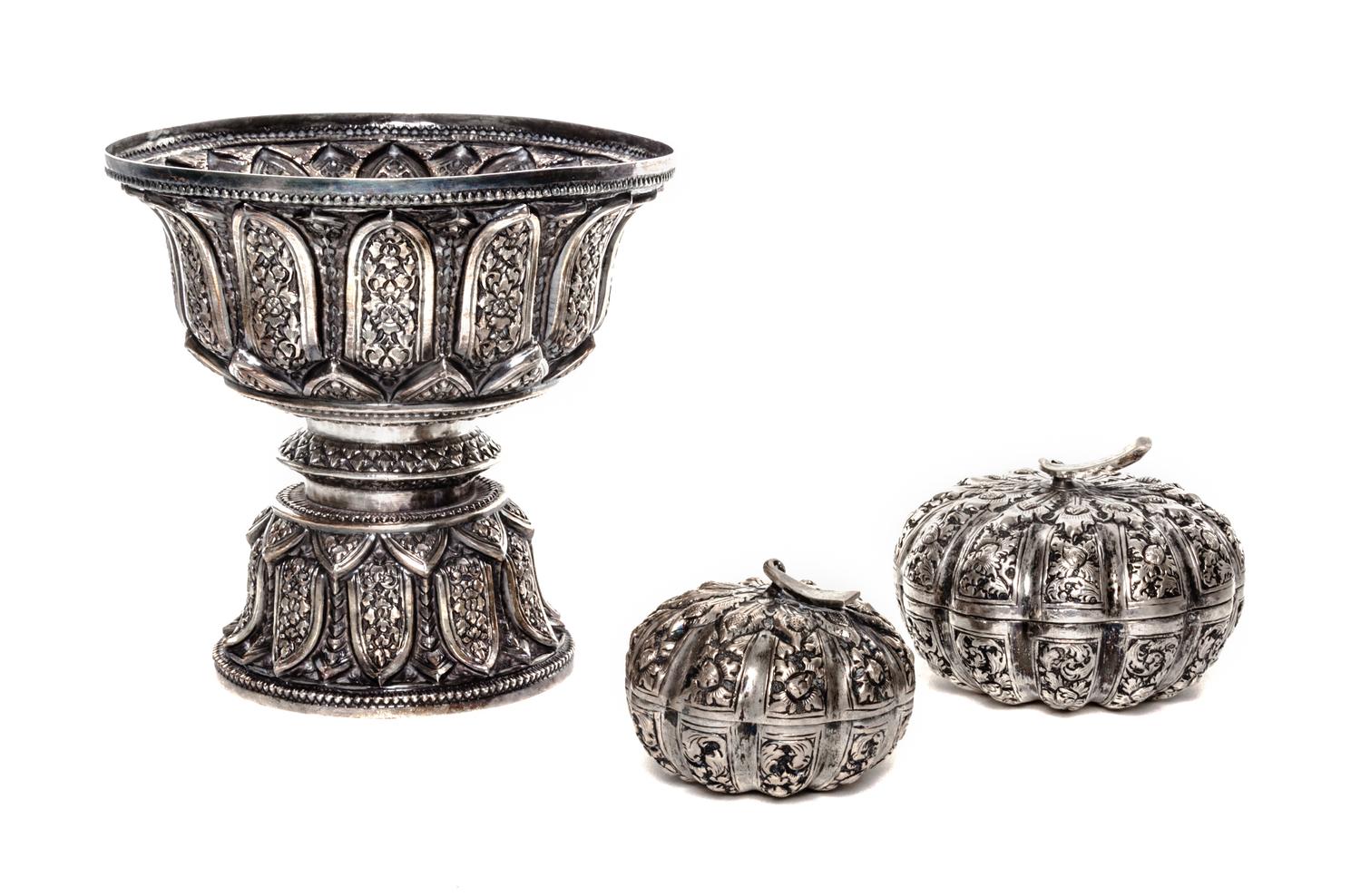 Three Thai Silver Articles, 20th Century, comprising a baluster form vase and two melon form boxes.