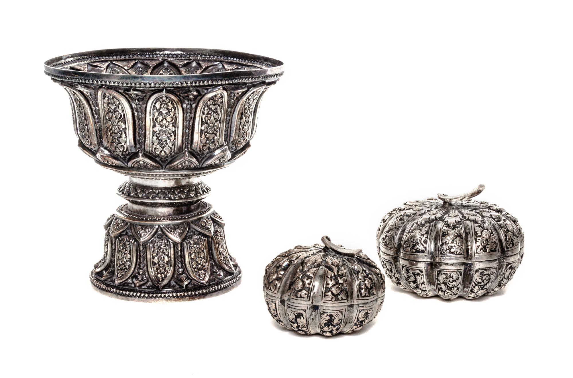 Three Thai Silver Articles, 20th Century, comprising a baluster form vase and two melon form boxes.