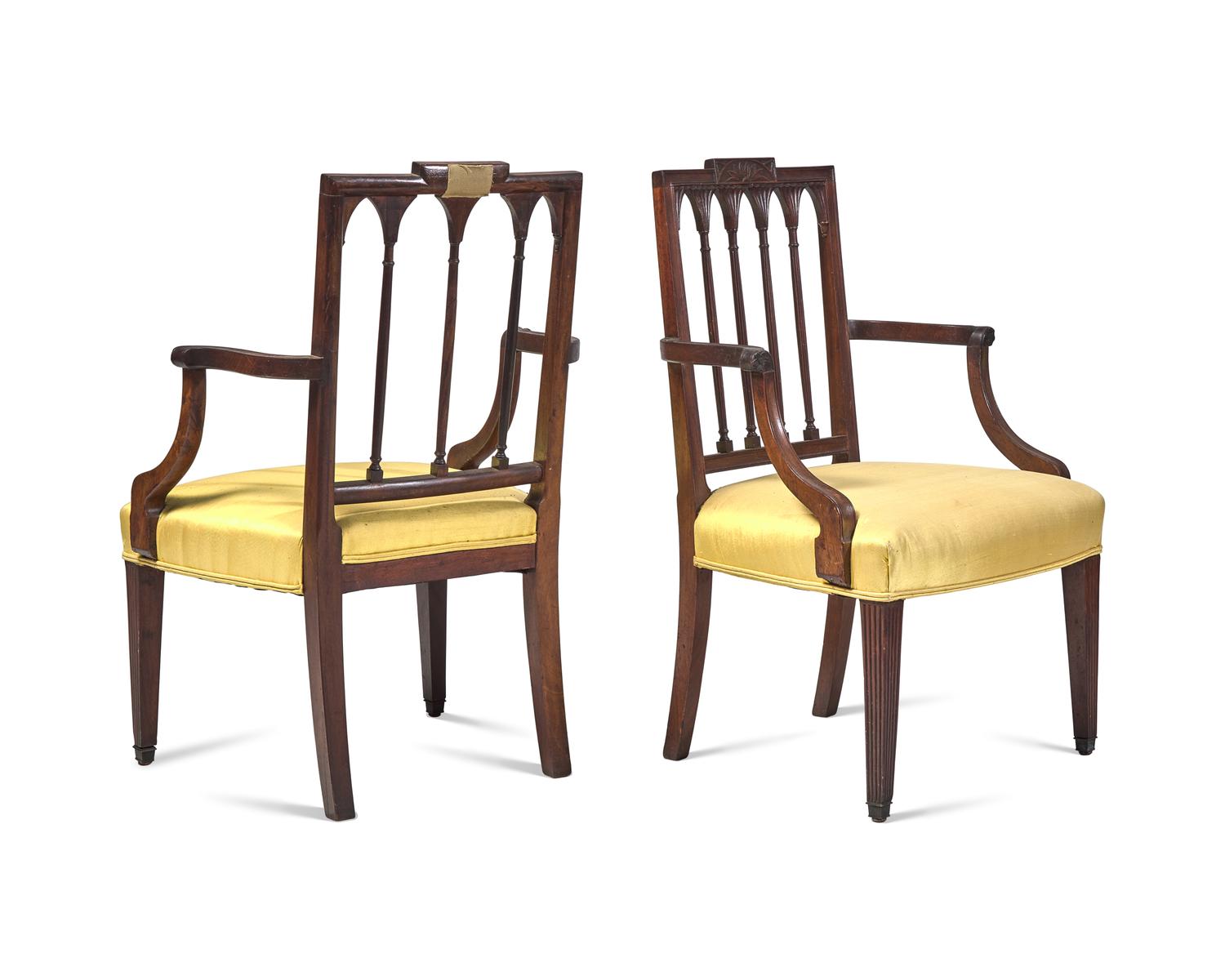 An Assembled Pair of Federal Carved Mahogany Armchairs