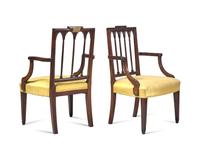 An Assembled Pair of Federal Carved Mahogany Armchairs