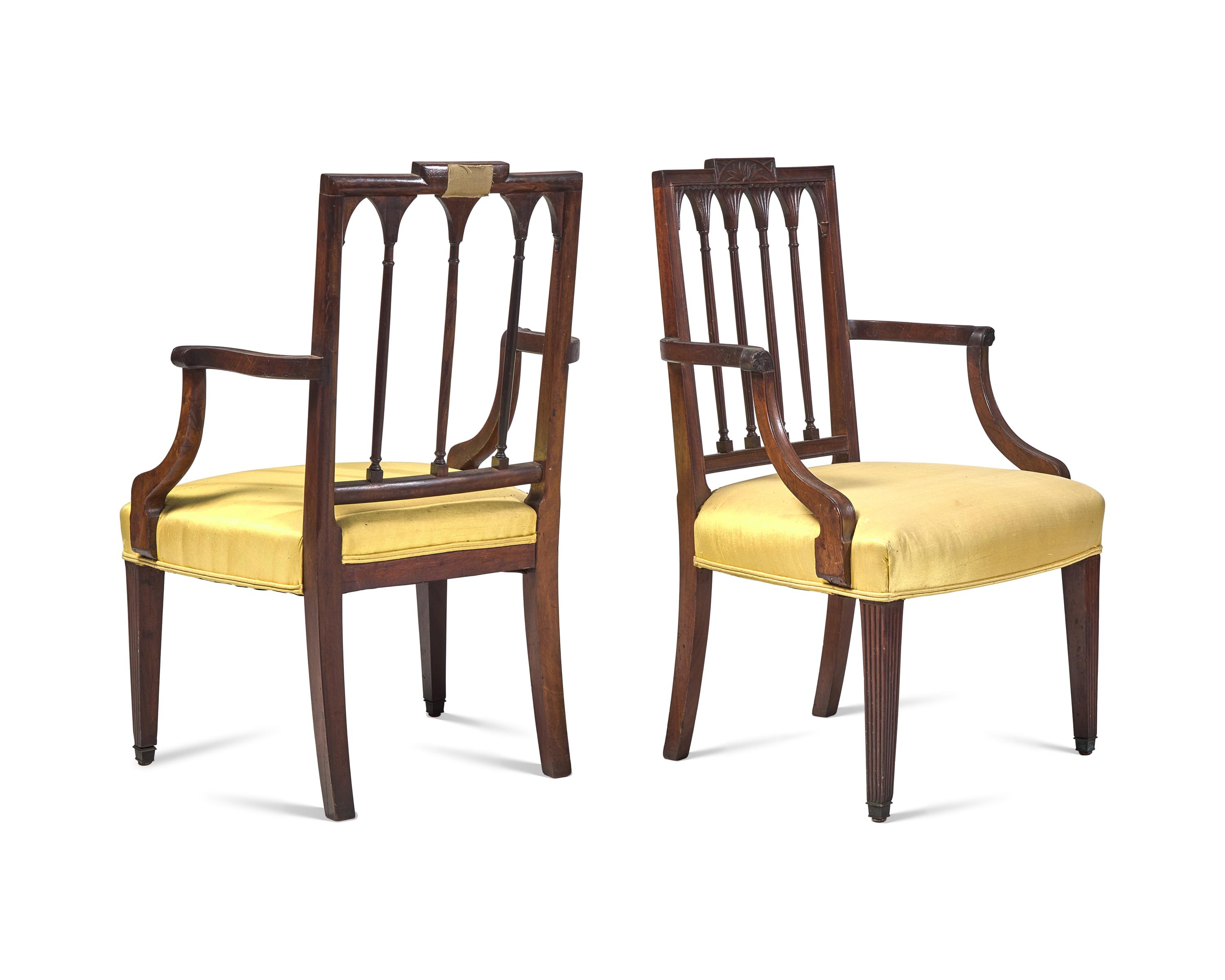 An Assembled Pair of Federal Carved Mahogany Armchairs