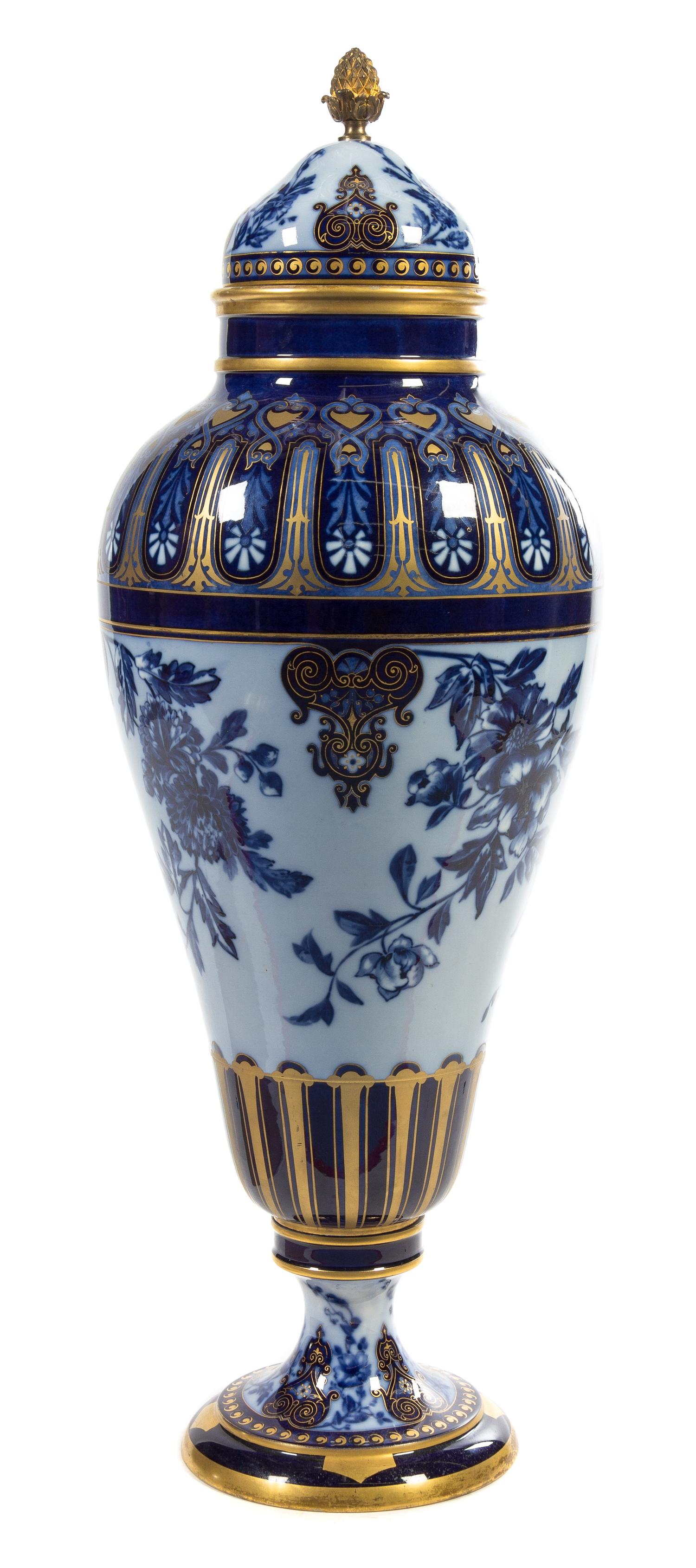 A Large Sevres Style Porcelain Urn and Cover Height 46 1/2 inches.