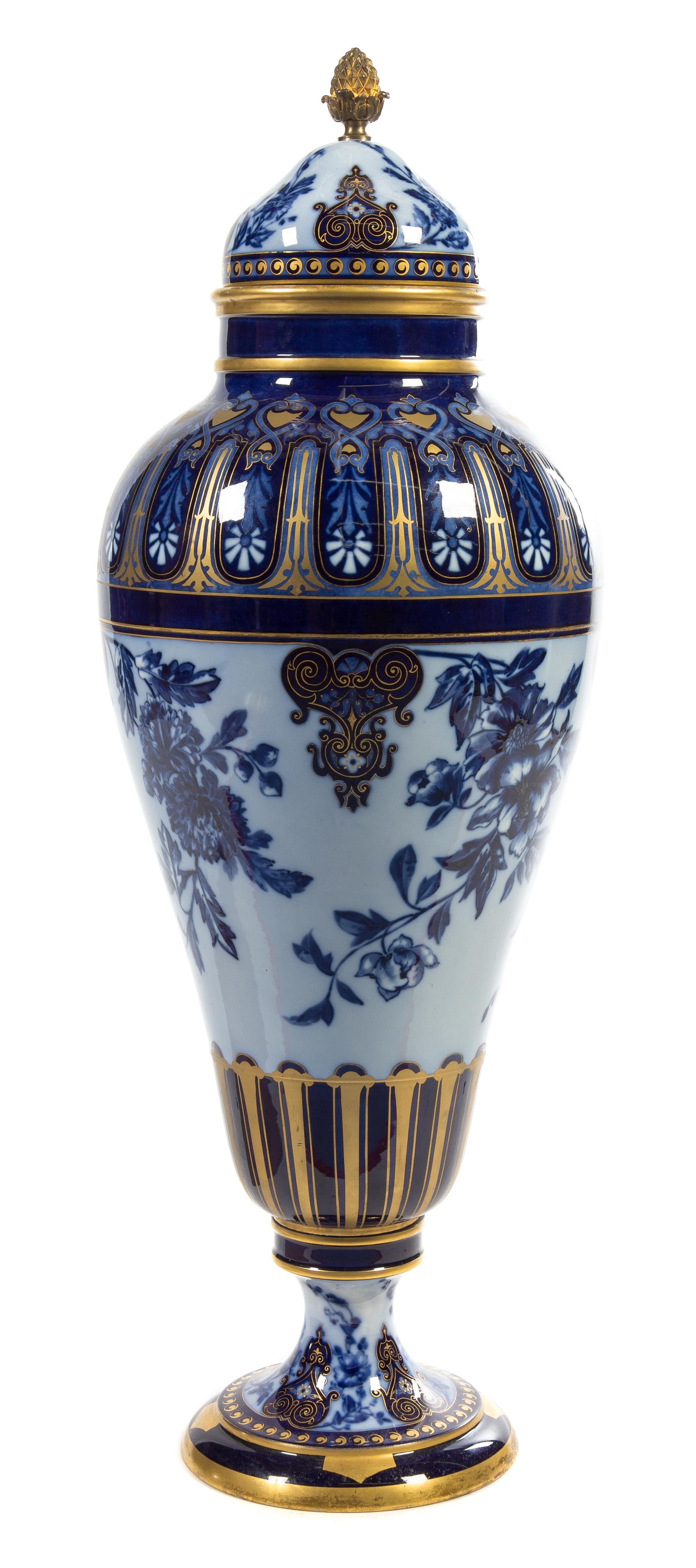 A Large Sevres Style Porcelain Urn and Cover Height 46 1/2 inches.