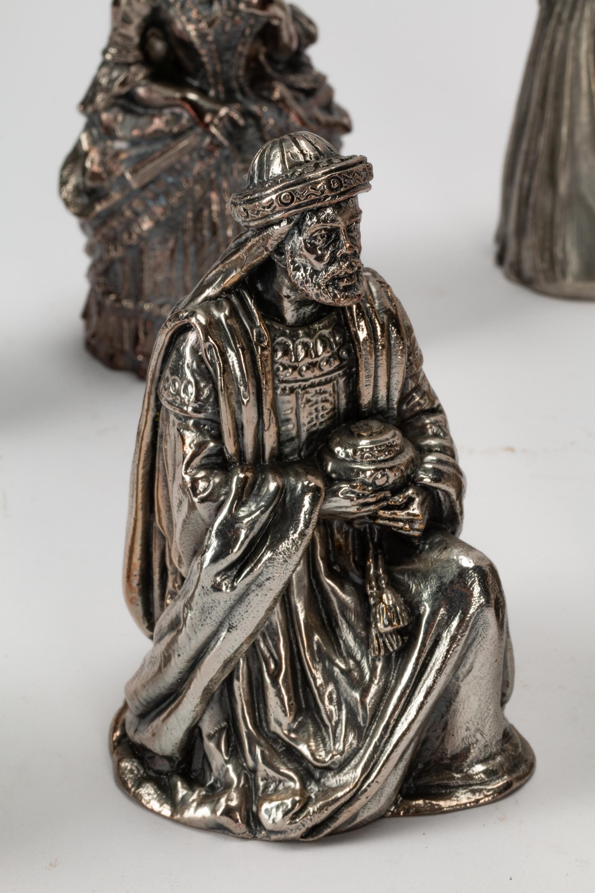 A Collection of Eighteen Continental Silver-Plate Figural Bells