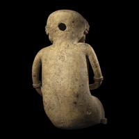 A Nayarit Terracotta Seated Figure with Dog