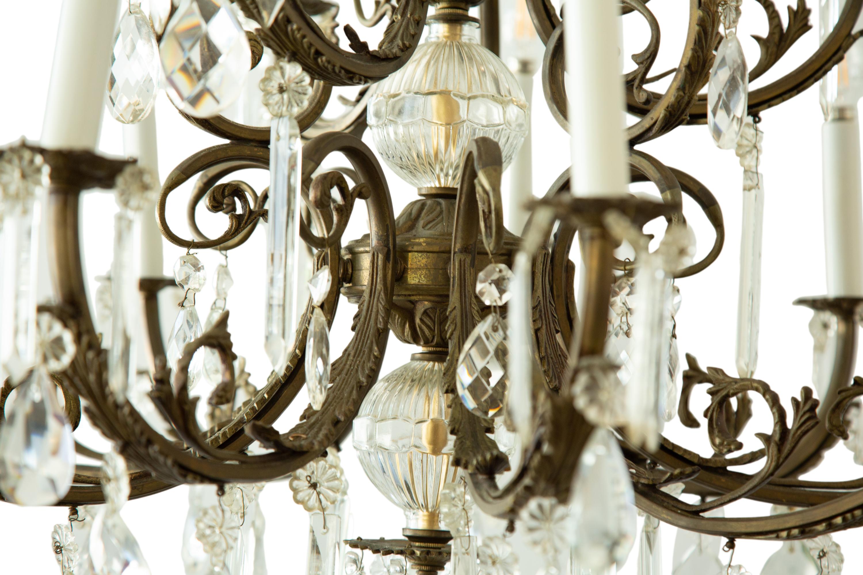 A Continental Gilt Bronze and Glass Twelve-Light Two-Tier Chandelier