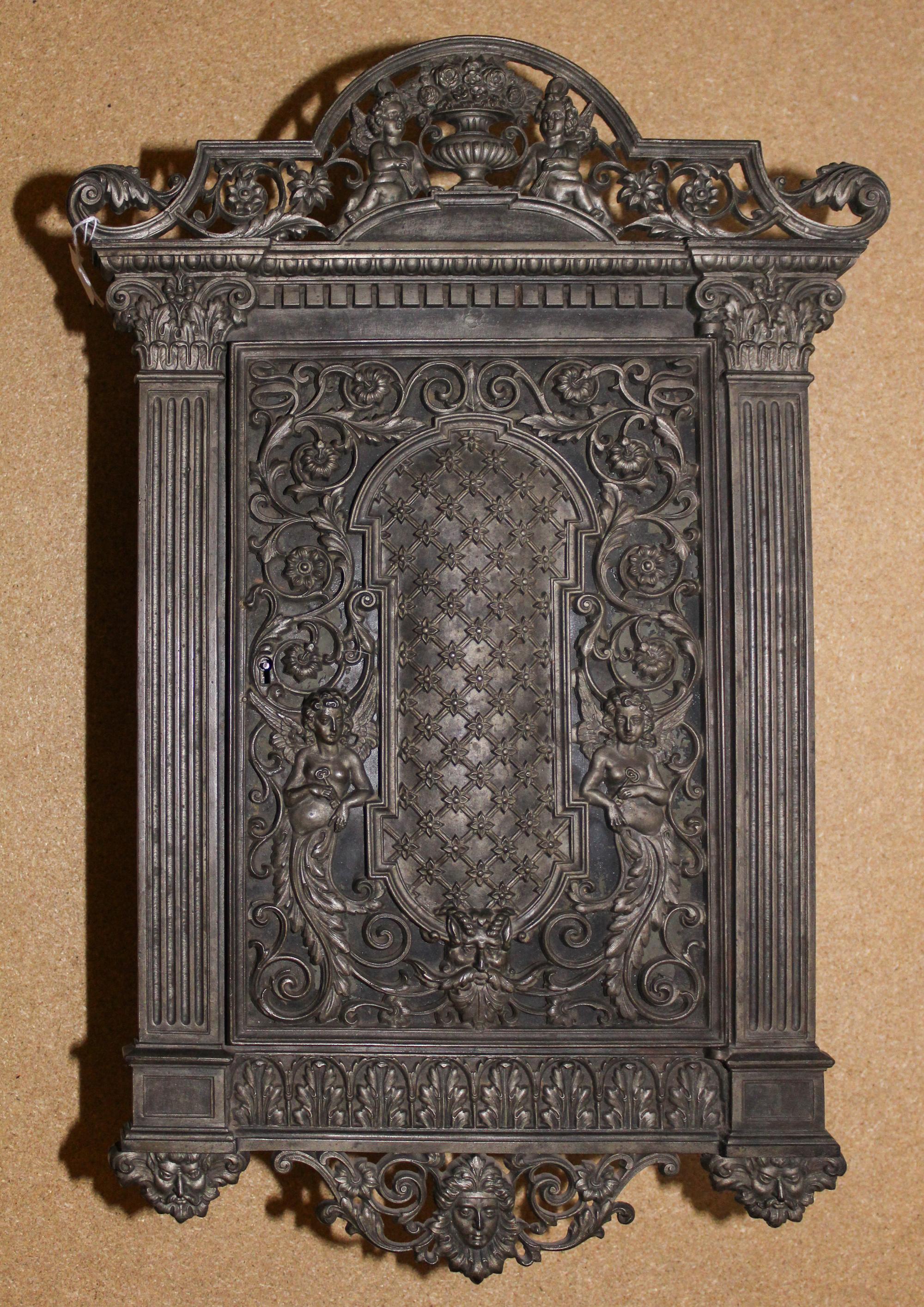 A Neoclassical Metal Wall Cabinet Height 23 1/4 x width 15 1/2 inches.