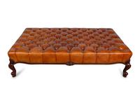 A Leather Tufted Ottoman — 20TH CENTURY