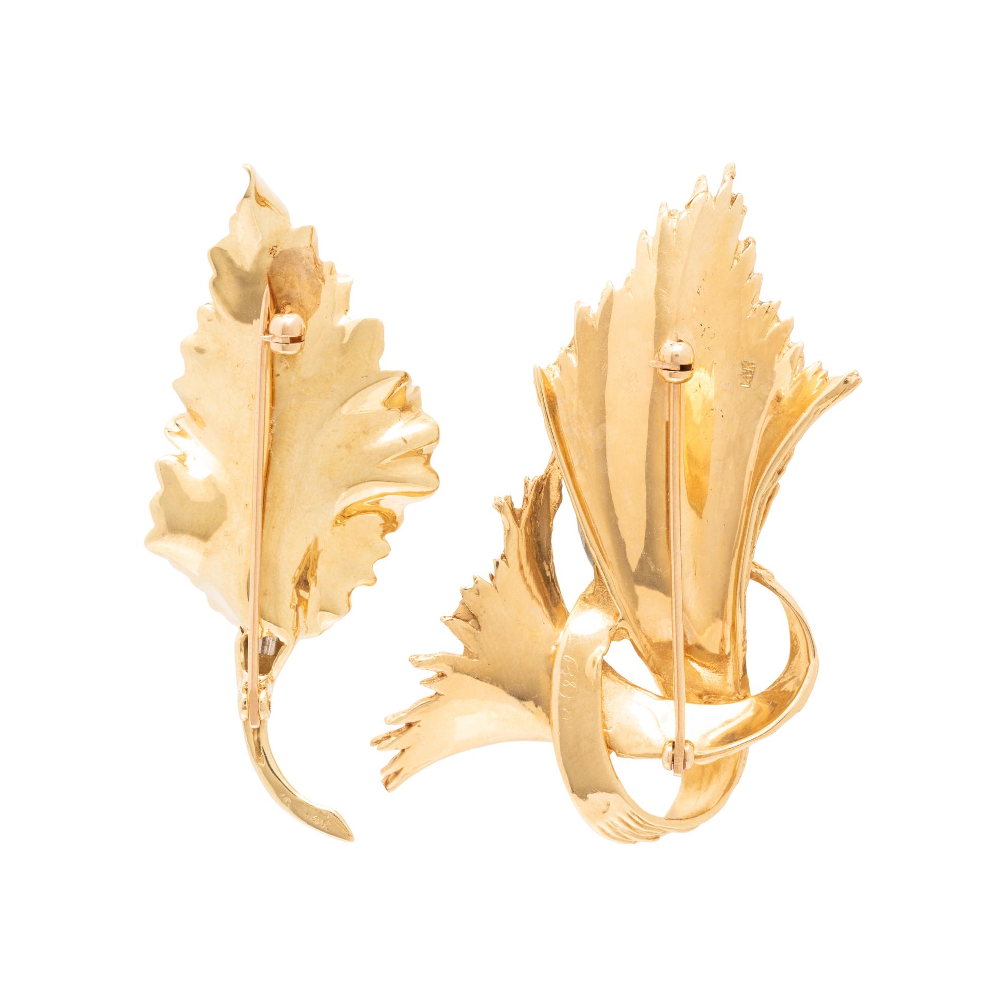 COLLECTION OF YELLOW GOLD BROOCHES