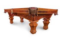 A Brunswick Ashbee Mahogany Pool Table and Chair