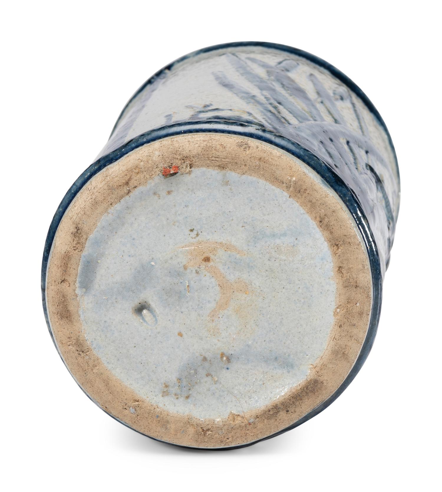 An 'Old Sleepy Eye' Molded Stoneware Vase