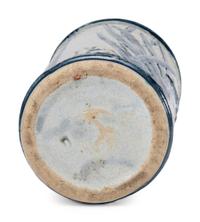 An 'Old Sleepy Eye' Molded Stoneware Vase