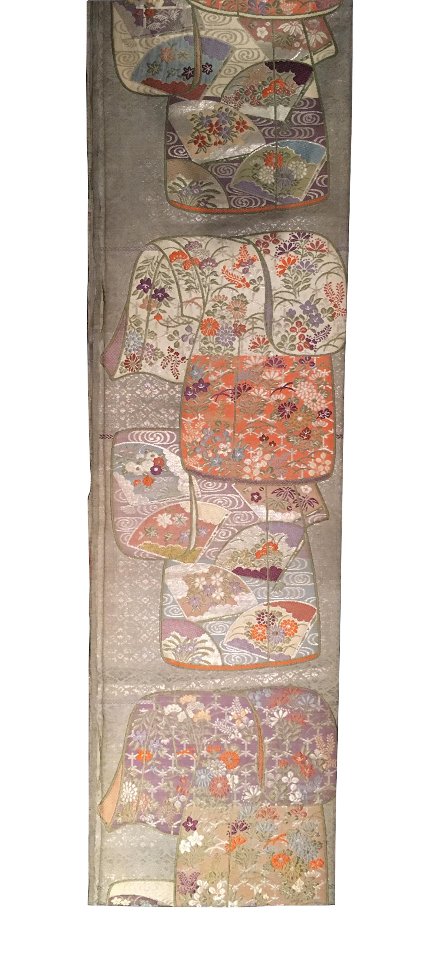 A Japanese Brocade Obi Wall Hanging Length 9 feet 8 inches x width 2 feet 3 inches.