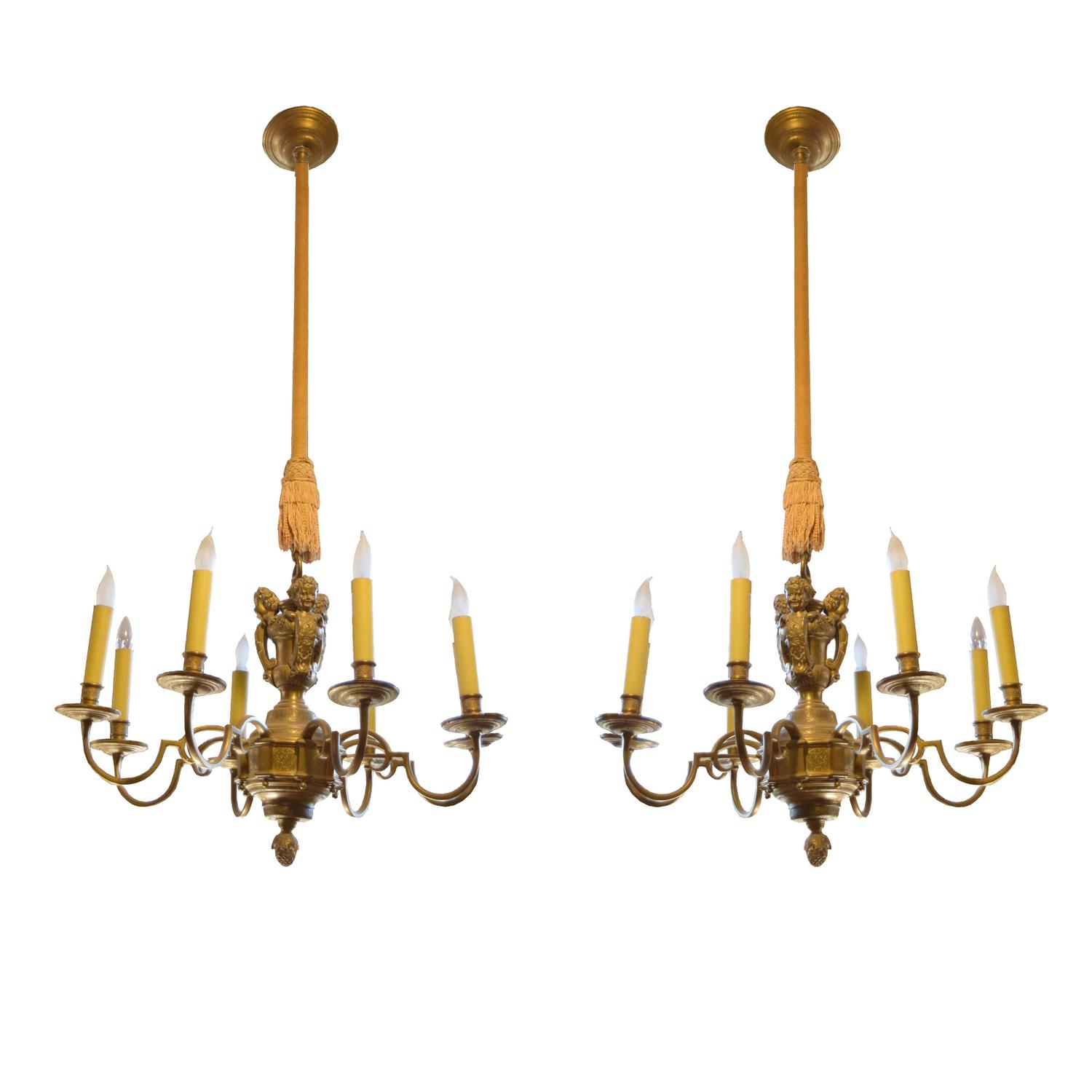 A Pair of Brass Eight Arm Chandeliers 34" W x 34" D x 53" H — United States, Circa 1920