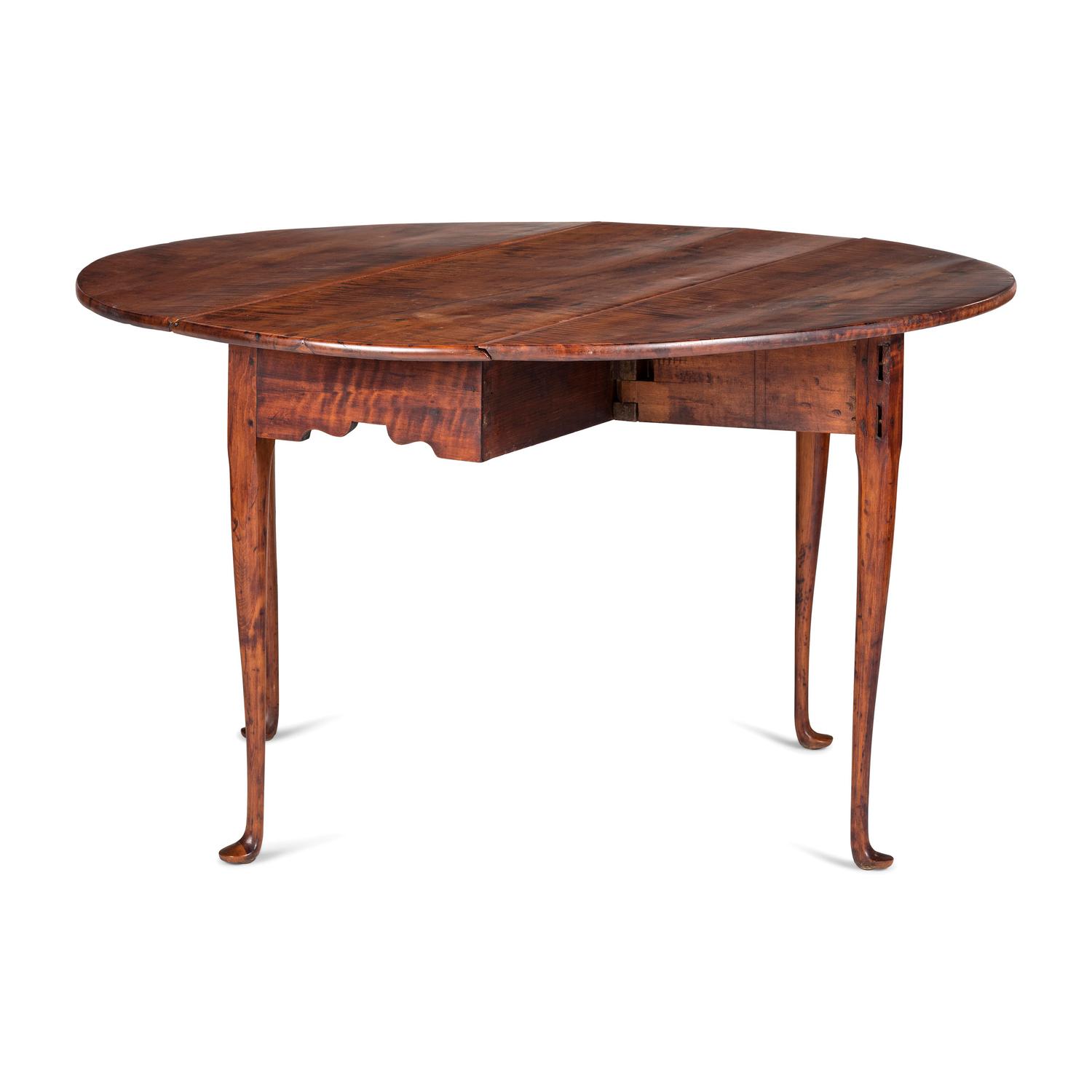 A Queen Anne Tiger Maple Pad-Foot Drop-Leaf Table