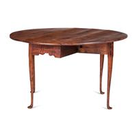 A Queen Anne Tiger Maple Pad-Foot Drop-Leaf Table