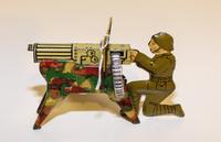 A Tin Windup Toy, Likely Marx Height of tallest 4 1/2 inches. — FIRST HALF 20TH CENTURY