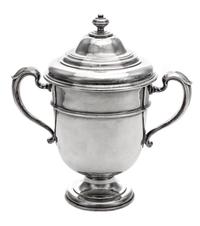 An English Silver Twin-Handled Cup and Cover, Lionel Alfred Crichton, London, 1924, the domed lid with a knopped finial above the balus