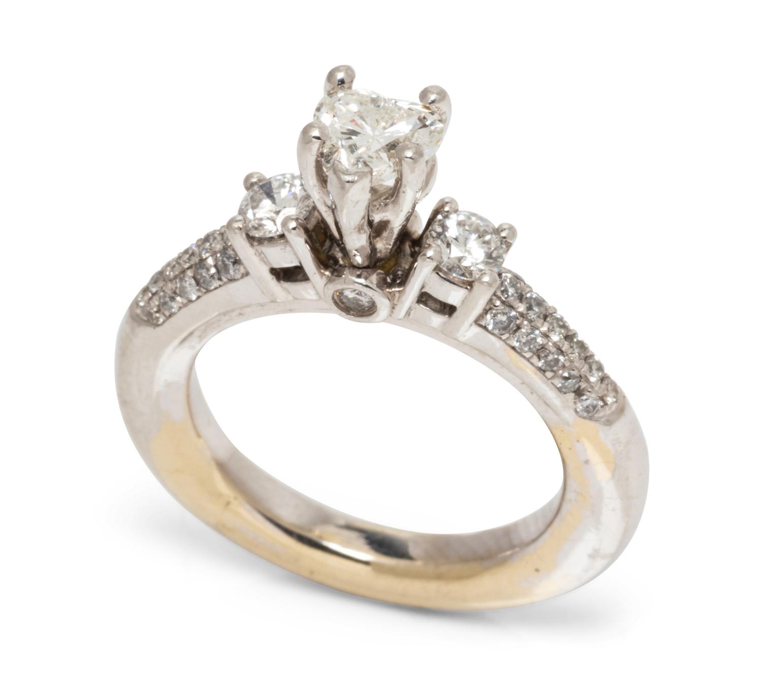 A Platinum, White Gold and Diamond Ring,