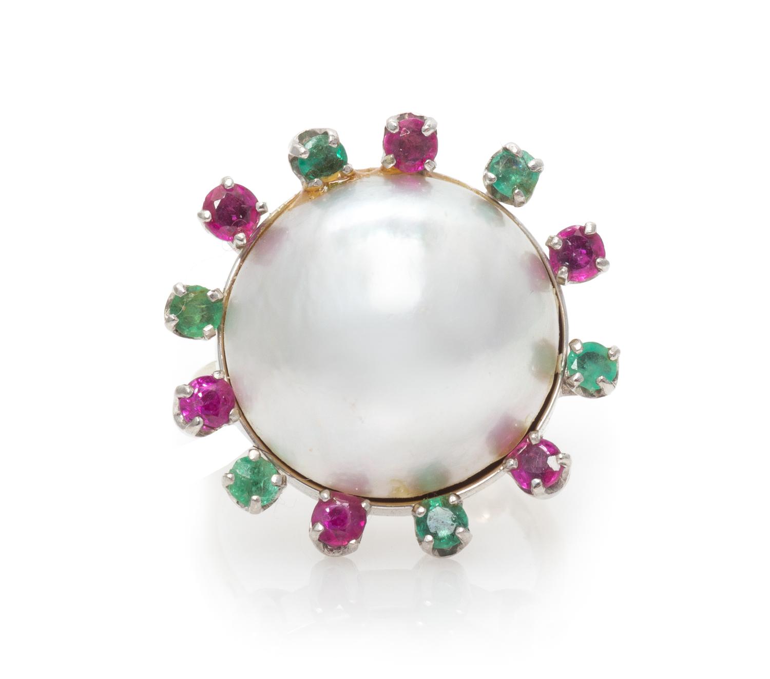 A 14 Karat White Gold, Mabe Pearl, Emerald and Ruby Ring, 5.20 dwts.