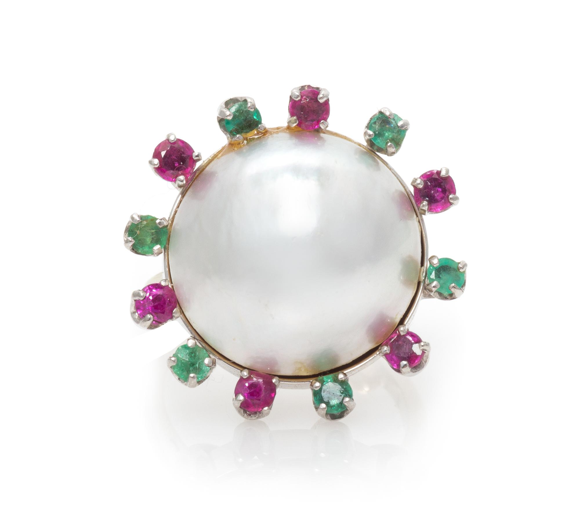 A 14 Karat White Gold, Mabe Pearl, Emerald and Ruby Ring, 5.20 dwts.