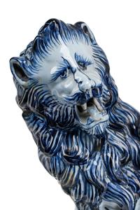 A Pair of French Faience Lion-Form Candlesticks